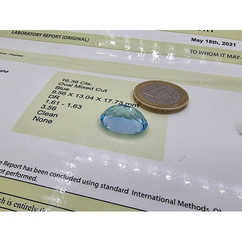 54 - An oval mixed cut blue topaz of 16.36 carats. A clean, desirable stone. Beautiful stone looks like a... 