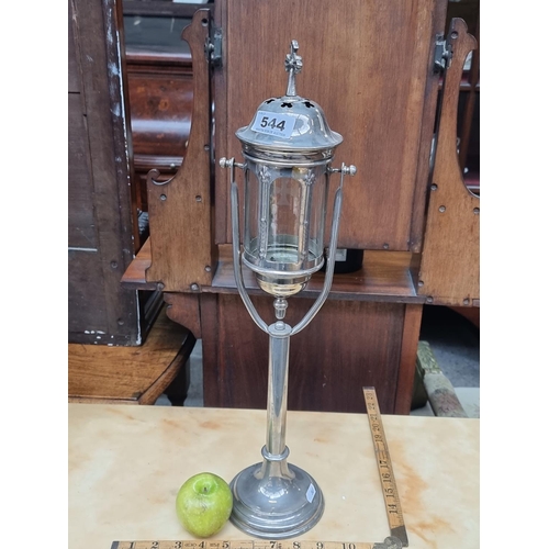 544 - A beautiful silver plated antique Christian swinging  Altar lamp with glass. It features Fleur-de-Li... 