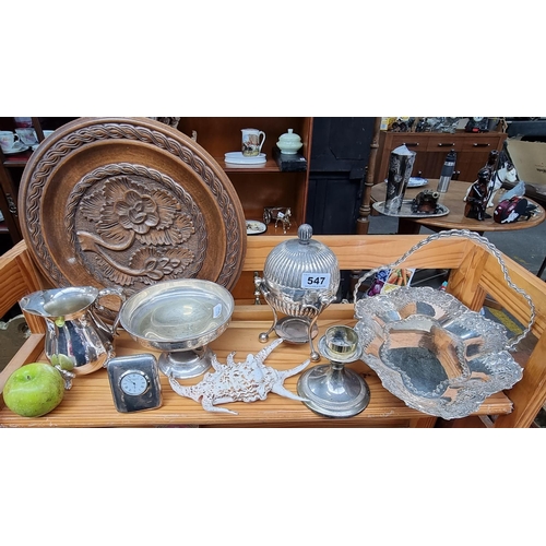 547 - A collection of 7 items - Very good lot of silver plate, inc a muffin dish and carved plate.