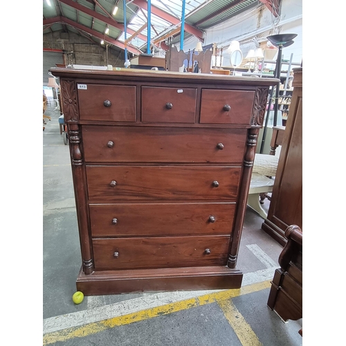 613 - Seven drawer rich mahogany bedroom chest, with floral detail and carved side pillars. Very heavy, su... 