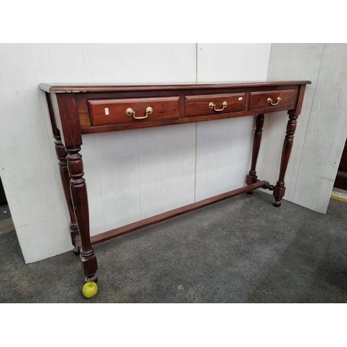 615 - Rich mahogany, two-drawer console table. With turned legs and stretcher base. Very heavy, super qual... 