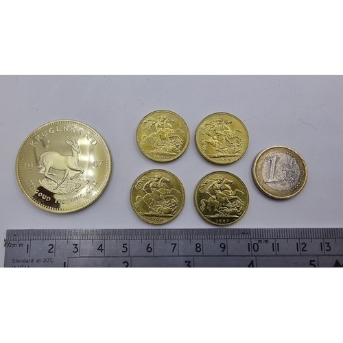 70 - Four reproduction gold sovereigns, one with young queen Victoria head, together with reproduction So... 