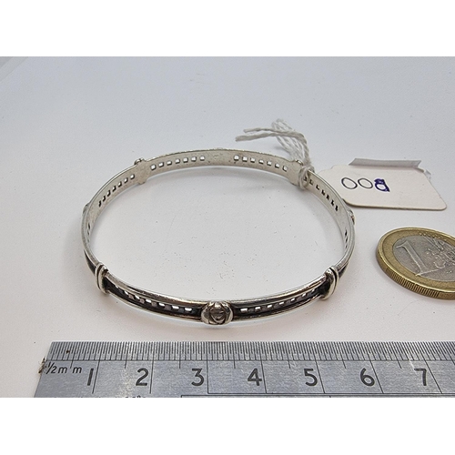 8 - A sterling silver bracelet after famous designer Charles Rennie McIntosh. A very desirable item. Wei... 