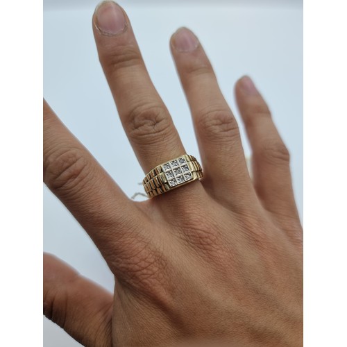 58 - A gentleman's wide embossed band, 9 carat gold, 9 stone diamond ring. Weight of ring 7g, size V.