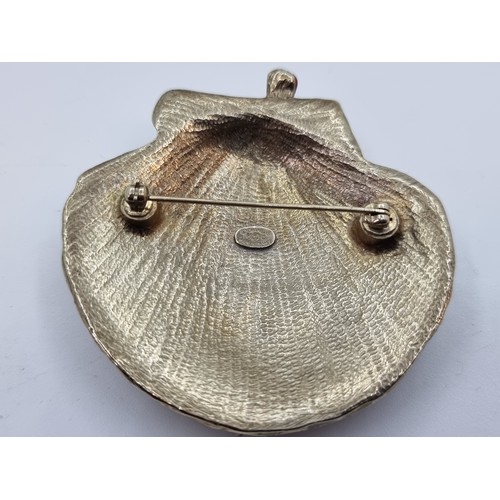 403 - Star Lot : Designer Chanel enamel brooch (made in France) with Chanel motif with gem stone accents. ... 
