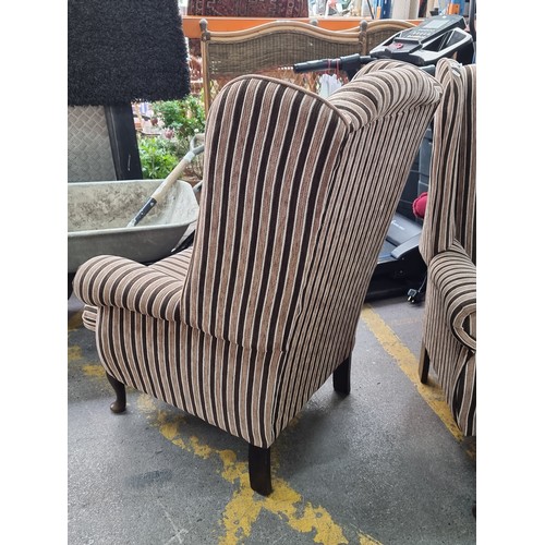 610 - Super pair of stripey large wing-back armchairs. Very comfortable.