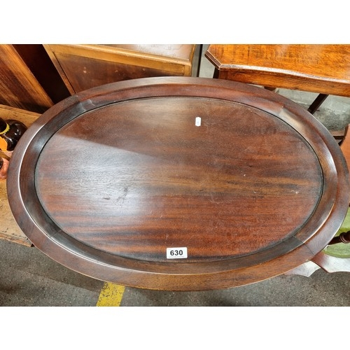 630 - An Elegant Dark Wood Oval Drinks Cabinet with Bevelled Glass Panels ,a Removeable Serving Tray Top a... 