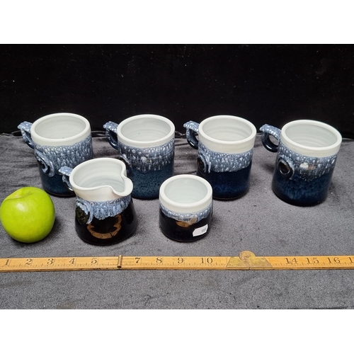 126 - 6 Pieces of Glazed Ceramic art pottery by  Paul Maloney Including 4 mugs, sugar and milk.