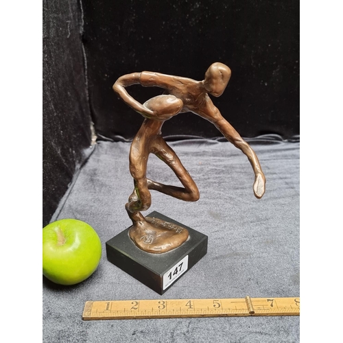 147 - An Abstract Bronze Sculpture Depicting a Figure Playing Rugby. Heavy signed on the base. Signed 'Bro... 