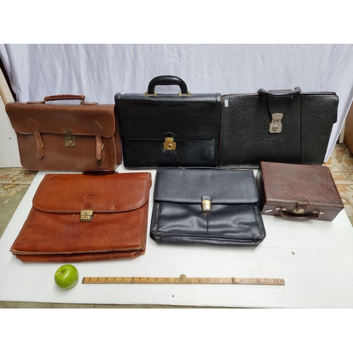 161 - A Collection of 5 Leather Brief cases and a Vintage Hard Leather Grooming Travel Case.