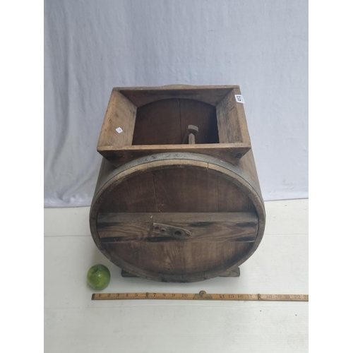 412 - An antique wooden butter churn.