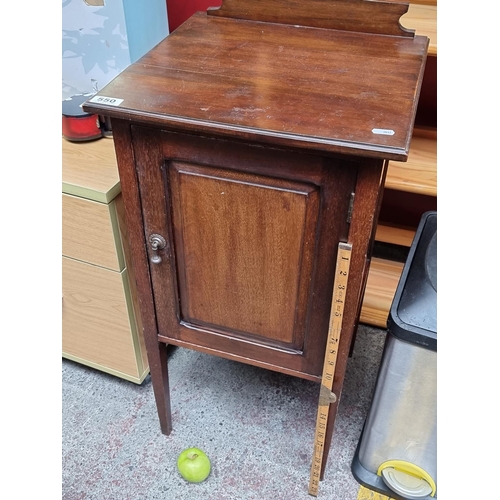 550 - A neat sized vintage pot cupboard with drop handle.