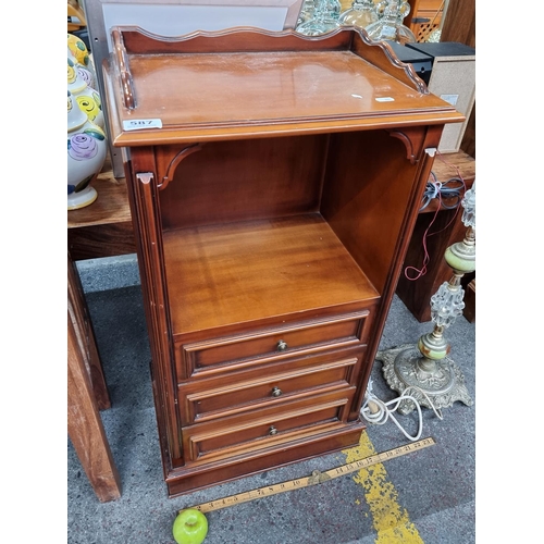 587 - A good sized golden oak locker with three drawers and brass fittings with Gallery back maybe  a musi... 