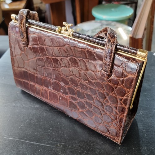 657 - A large collection of Retro Handbags and Purses including Italian leather examples.