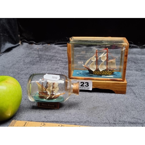 123 - 2 Neat Size Model Ships in Glass Displays Including The 