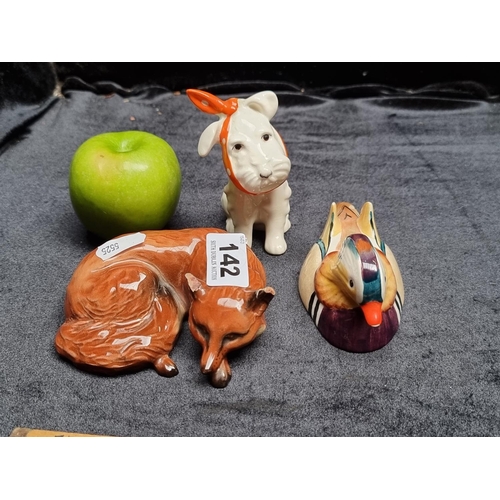 142 - 3 Beswick England Animal Figurines Including a Mandarin Duck, a Fox and a West Highland Terrier. The... 