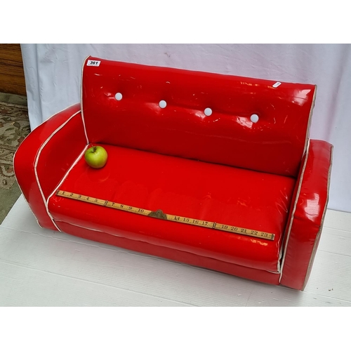 361 - A Red Retro Children's Sofa with Red Vinyl Upholstery and White Studs.