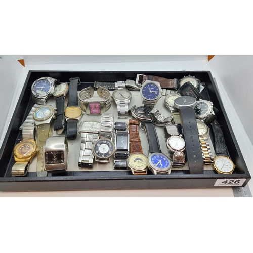 426 - A collection of 24 gentleman's watches, some vintage. Including examples by Pulsar and Sekonda.