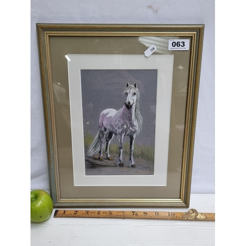 63 - A neat sized framed chalk pastel equestrian study. Artist initials bottom right.