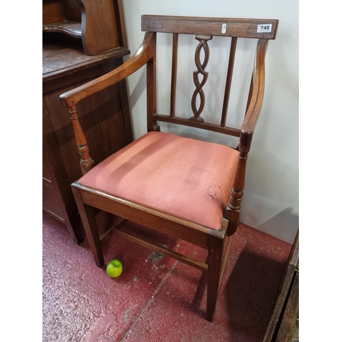 748 - A vintage occasional chair with red upholstered seat.