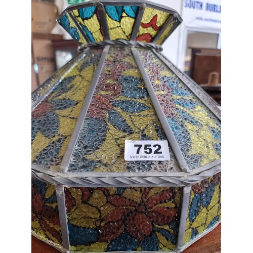 752 - A large antique Tiffany Style ceiling light shade with stained glass floral detail.