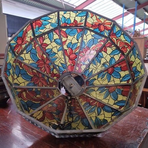 752 - A large antique Tiffany Style ceiling light shade with stained glass floral detail.