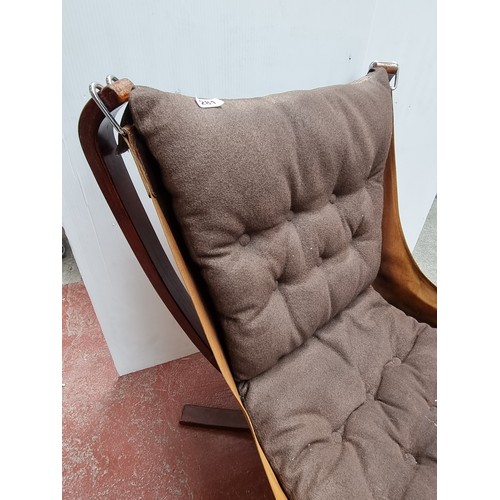 281 - Super designer Suspension  Falcon chair by Sigurd Resell. One on the four legs has been repaired but... 