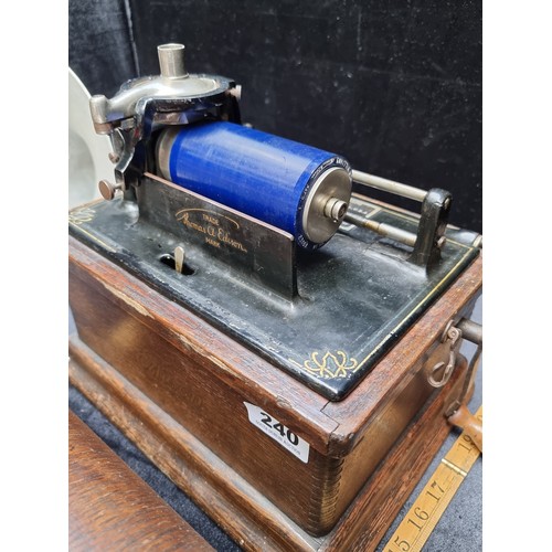 240 - An antique Thomas A Edison, hand-cranked early fireside phonograph with replacement horn.