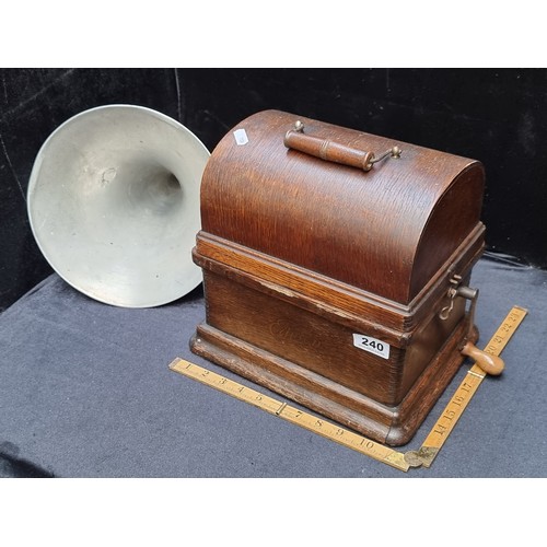 240 - An antique Thomas A Edison, hand-cranked early fireside phonograph with replacement horn.