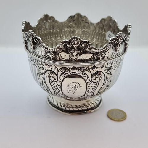 3 - A very fine large sterling silver, footed bowl. Profusely decorated, with insignia F to front. Maker... 