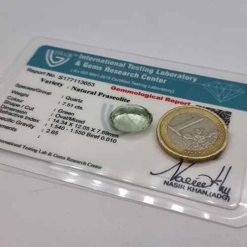 69 - An oval natural praseolite stone. Weight 7.51 carats. Comes with certificate. A very very bright imp... 