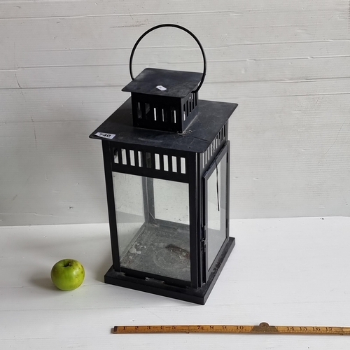 740 - A large garden lantern.