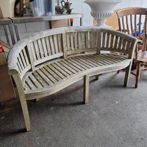 761 - A large Alexander rose  curved garden bench.