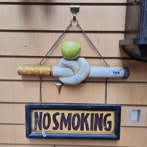 88 - Vintage No Smoking sign with a knotted cigarette.