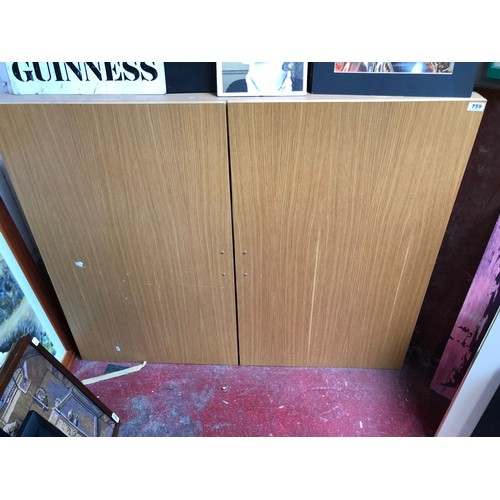 759 - Large teachers's aid. Wooden cabinet containing a roll-down projector screen, whiteboard screen, lar... 