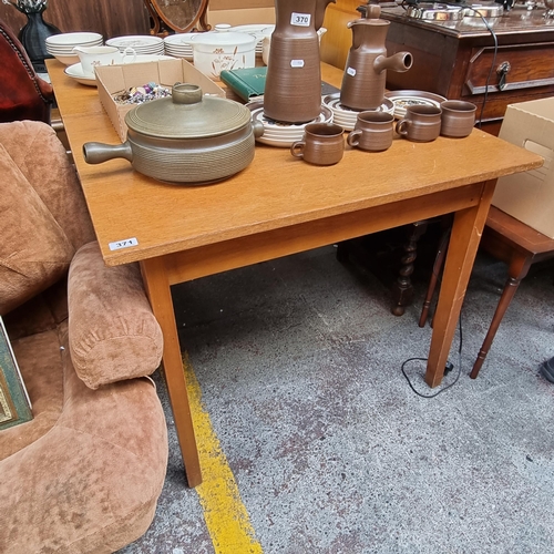 371 - An Extendable Scandavian Mid century Dining Table.