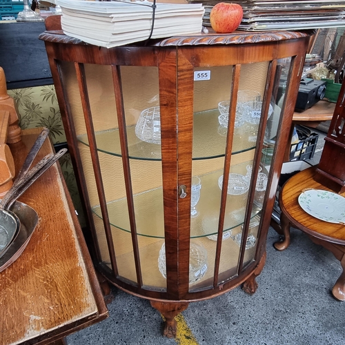 555 - A half moon display cabinet with two glass shelves interior, lovely glass door with a key, a gallery... 