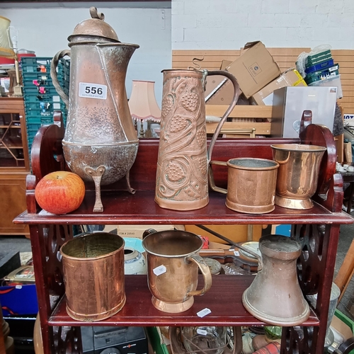 556 - Seven antique copper items including coffee pots, cups and containers.