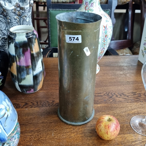 574 - A Large Brass shell