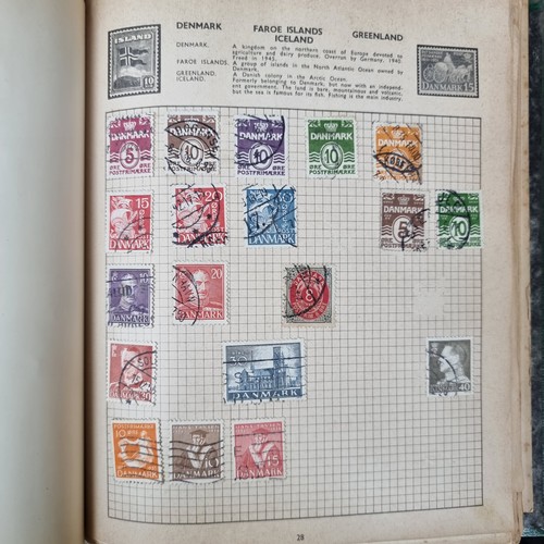 369 - A Pair of Good Stamp Albums Including a Dark Grey and Green Example.