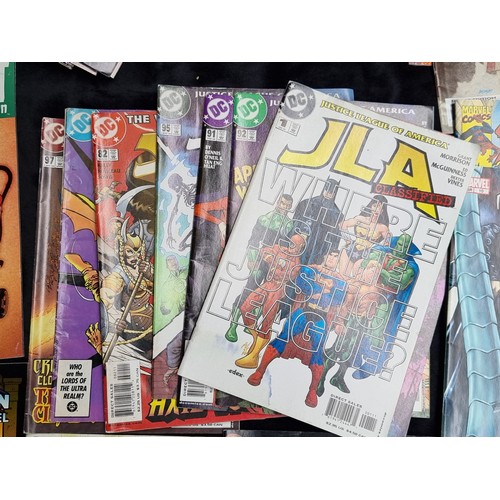 317 - A large collection of new/old stock DC comics featuring classics such as X-Men, Spiderman, Captain A... 