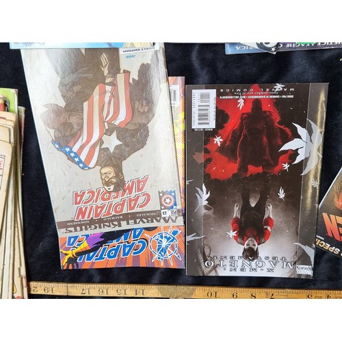 317 - A large collection of new/old stock DC comics featuring classics such as X-Men, Spiderman, Captain A... 