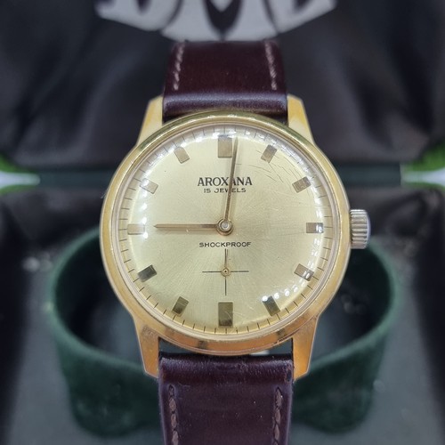 4 - A nice example of a gentleman's Aroxana set 15 jewelled wristwatch with leather strap. In presentati... 