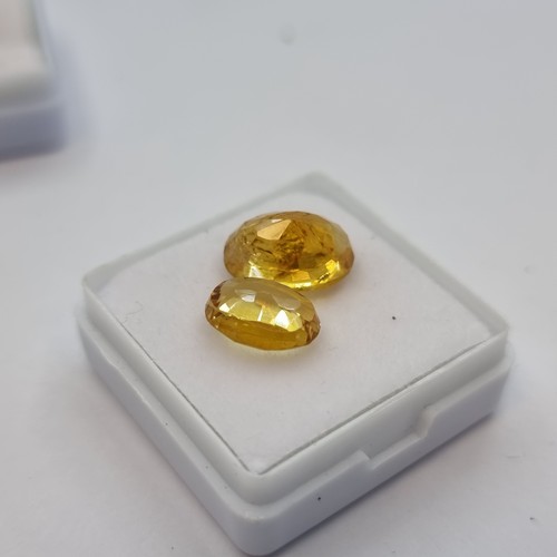 416 - A natural citrine stone, yellow in colour, weight 2.20 carats. Comes with gemstone certificate. Toge... 