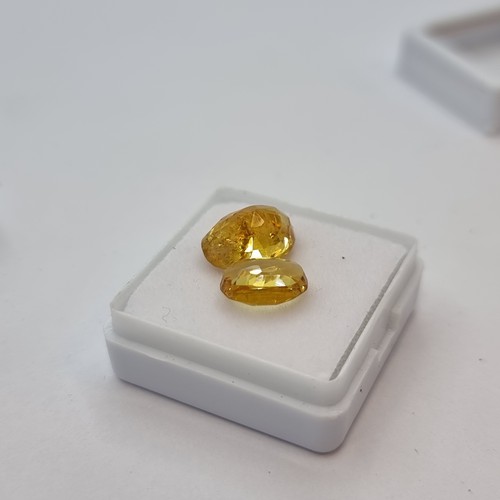 416 - A natural citrine stone, yellow in colour, weight 2.20 carats. Comes with gemstone certificate. Toge... 