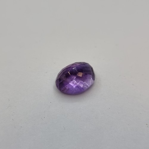 415 - A natural amethyst, weight 5.37 carats. Comes with gemstone certificate. Together with a natural sty... 