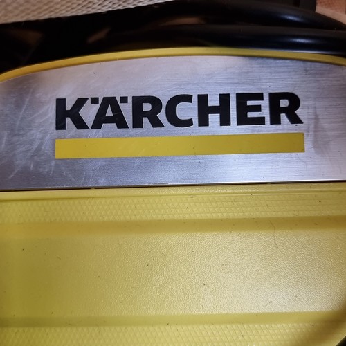 252 - Karcher power washer K2 Compact with hose.