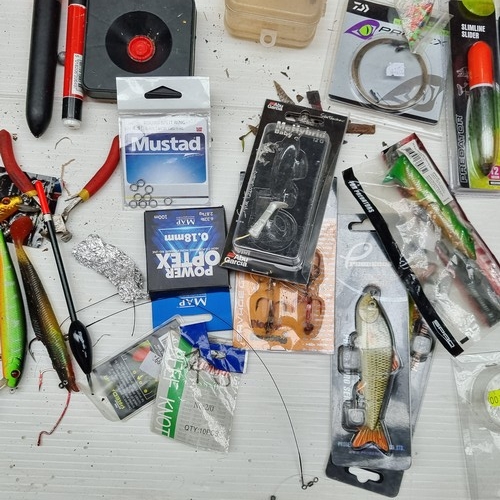 226 - Large Bag filled with fishing supplies including line, hooks, weights, mixed tackles including lots ... 