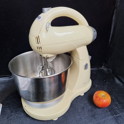 560 - Two items including a Delta electrical stand mixer and a 12 piece Espresso cup and saucer set by Gra... 