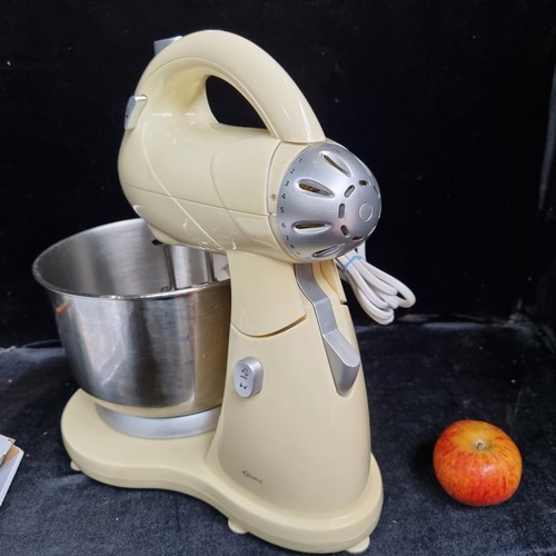 560 - Two items including a Delta electrical stand mixer and a 12 piece Espresso cup and saucer set by Gra... 